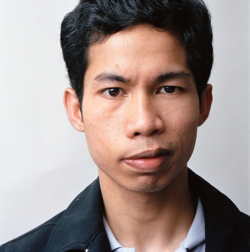 Young man in dark blue jacket, 2009